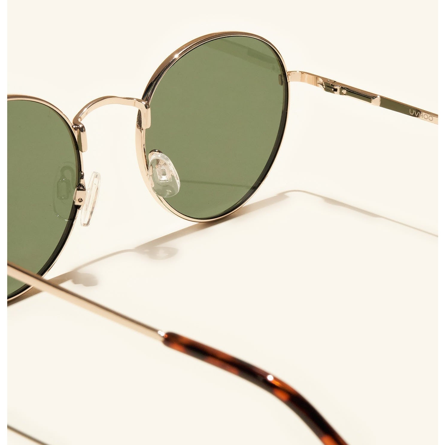 gafas de sol redondas#es:color_verde,en:color_green,it:colore_verde