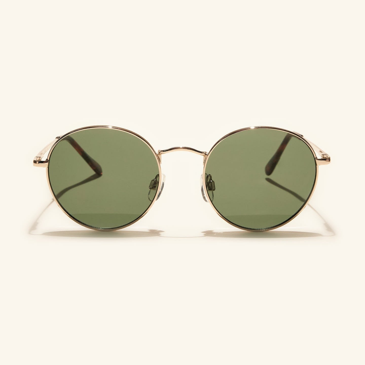 gafas de sol redondas#es:color_verde,en:color_green,it:colore_verde