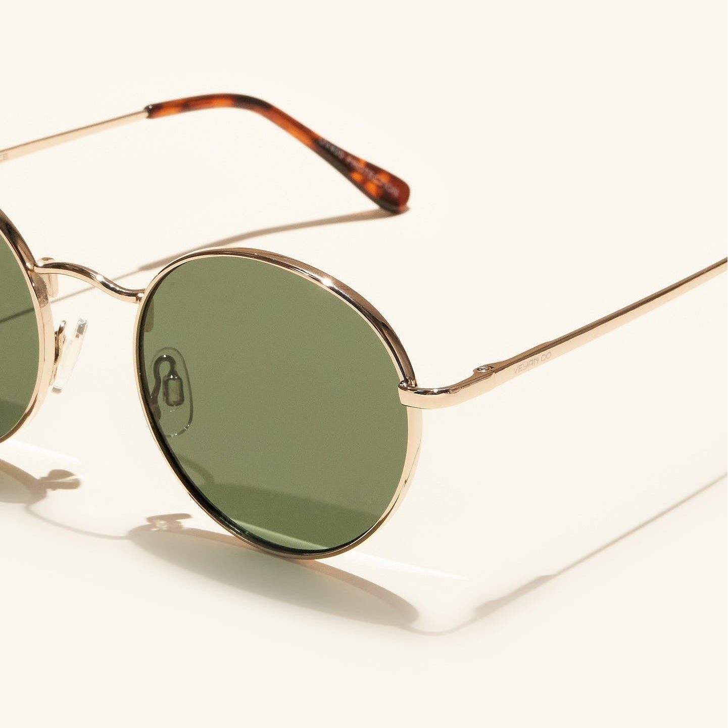 gafas de sol redondas#es:color_verde,en:color_green,it:colore_verde